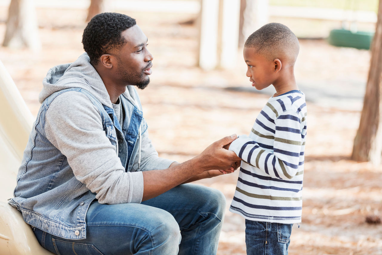 Dad talking to son about inappropriate language