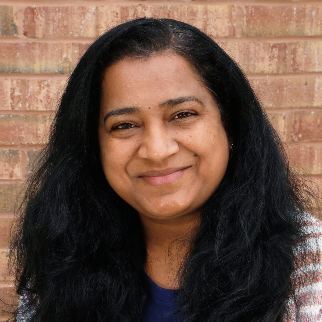 Ms Poovei